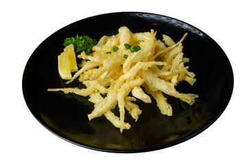 Close-Up of Grilled Fish Collar with Lemon.