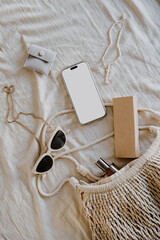 Flat Lay with Smartphone and Accessories on Beige Fabric, Simple Earthy Tones