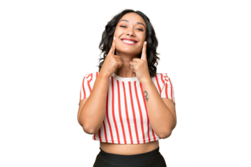 Young Argentinian woman over isolated background smiling with a happy and pleasant expression