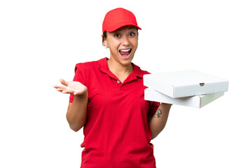 pizza delivery woman with work uniform picking up pizza boxes over isolated chroma key background...