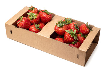 Healthy food and ingredients - Cardboard box full of natural organic ripe strawberries isolated on white background with built-in cutout outline