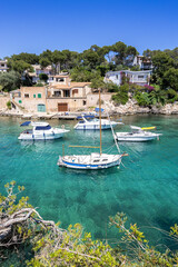 Bay of Cala Figuera on Mallorca island with boats holiday by the sea portrait format in Spain