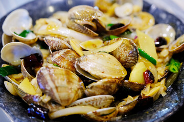 delicious spicy stir-fried clams seafood