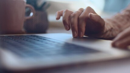 Close up of female finger using laptop trackpad scrolling website for online shopping and browsing. Distance learning, student hands close up with laptop, slow motion. - Powered by Adobe