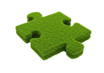 Isolated Green Grass Covered Puzzle Piece