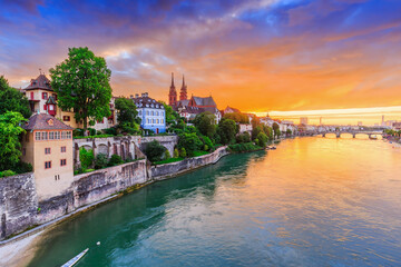 Basel, Switzerland. Old town with red stone Munster cathedral on the Rhine river.