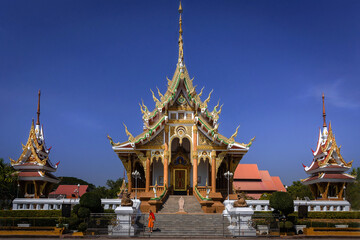 Fototapeta premium Thai Wat or Temple designs according to the Thai Budhist and Indian architecture. Beautiful places for travel and to understand religion and culture of the area.