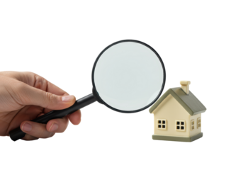 Isolated Magnifying Glass Inspecting Miniature House for Home Inspection