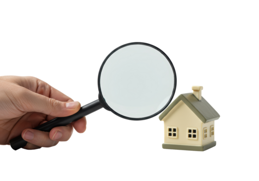 Isolated Magnifying Glass Inspecting Miniature House for Home Inspection