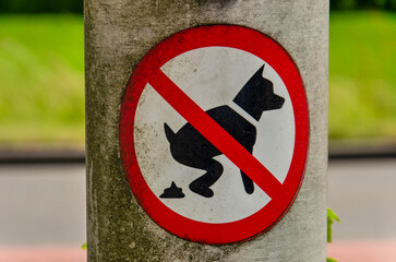 Cothen, The Netherlands, June 2, 2025: sign on a pole indicating the dogs are not allowed to defecate
