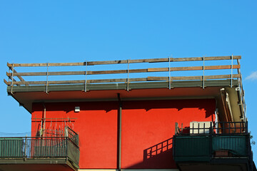 barrier planks are securely fixed to the roof structure during maintenance and repair of the condominium