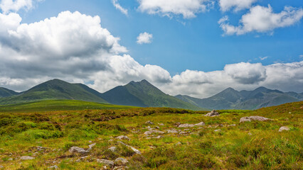 Striking view of the majestic Strickeen mountain range of County Kerry, Ireland, on a sunny day.