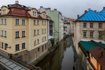 The river Čertovka in the center of the capital of the Czech Republic, Prague, on a cloudy spring day