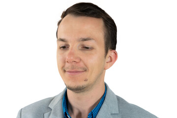 Man in gray suit looking down with slight smile, professional expression and neutral mood, isolated png portrait