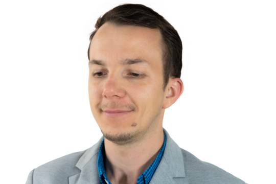 Man in gray suit looking down with slight smile, professional expression and neutral mood, isolated png portrait