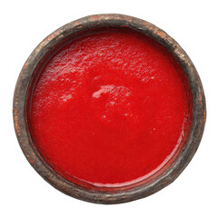 Red sauce in a round, dark-colored bowl