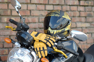 A sports bike. Motorsport. Front view. The gloves of the motorcyclist are located in the front, and...