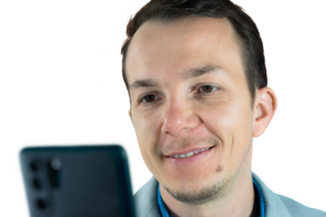 Smiling man looking at smartphone screen while wearing suit, joyful moment captured in corporate setting. isolated png