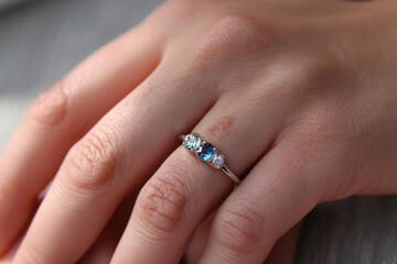 Elegant ring on hand displays meaningful gift