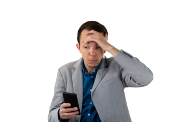 Businessman holding head in shock while reading smartphone, depicting bad news or digital error moment. isolated png