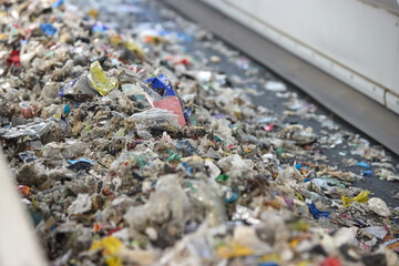 Industrial processing of Refuse-Derived Fuel (RDF) in a Waste-to-Energy plant, transforming municipal waste into sustainable energy sources. Ideal for: renewable energy, recycling processes.