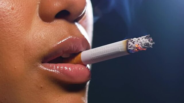 Video: Young woman smoking cigarette