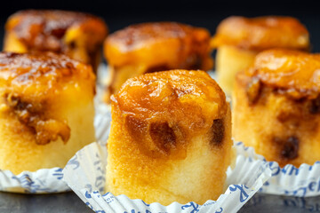Close-up of piononos, traditional sweet pastries from Granada, Spain.