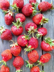 strawberries on a wooden background