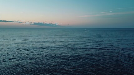 Fototapeta premium Vast Blue Ocean at Flat Camera Angle: Minimalist Coastal Serenity, Horizon-Defining Smooth Waters, and Endless Azure Depths in Soothing Maritime Photography