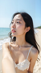 Pretty young woman taking selfie on beach
