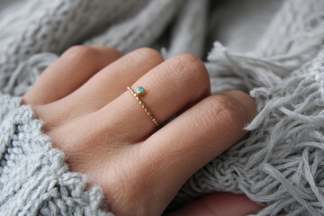 Woman shows off delicate ring, meaningful gift, presented with joy