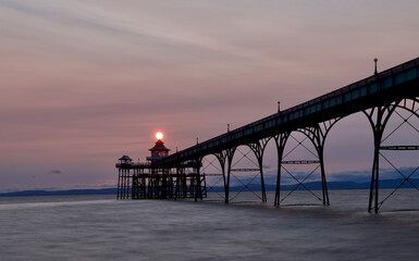 sunset over the Clevedon pier in England