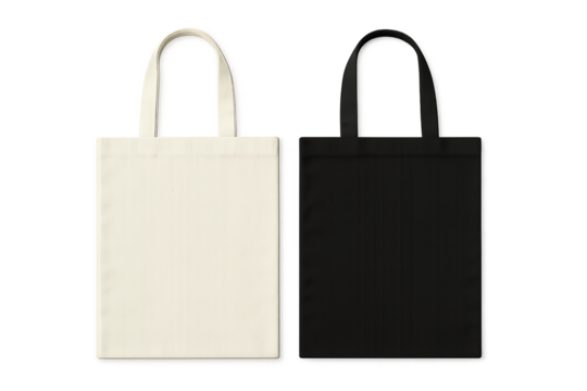 Two blank tote bags, one white and one black, with fabric handles on transparent background; concept for branding, packaging, and merchandise design