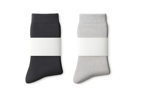 Close-up view of a pair of gray and black socks with blank white label packaging, concept for apparel product presentation, branding, and retail mock-up