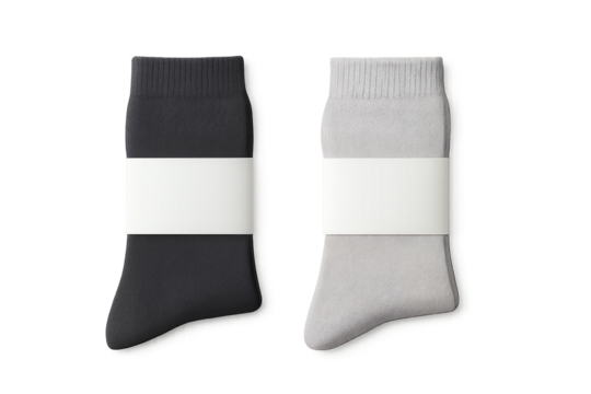 Close-up view of a pair of gray and black socks with blank white label packaging, concept for apparel product presentation, branding, and retail mock-up
