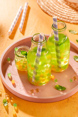 Sweet bubble tea made of juice, fruits and pearls.