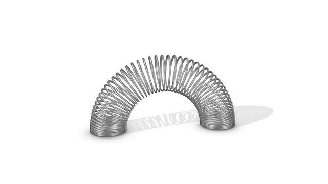 Slinky Toy on a White Floor. Stainless Steel Spring Toy 3D Animation. 4K