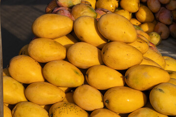Full frame shot of the Banganapalli mangoes sold by the road side vendors in the early morning