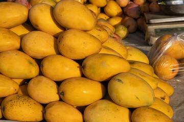 Full frame shot of the Banganapalli mangoes sold by the road side vendors in the early morning
