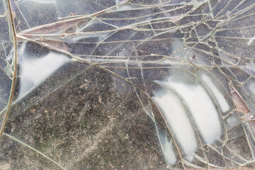 An natural abstract pattern found from the old broken glasses, decaying broken glasses