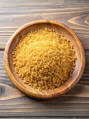 A wooden plate with a generous serving of wheat bulgur