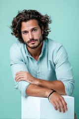 Chilled-out businessman in light chambray shirt