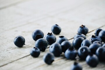 Close-Up of Ripe Blueberry Fruit – Fresh Vitamin-Packed Berries on Table.