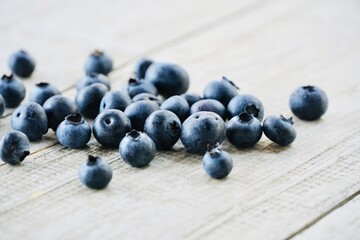 Fresh Blueberries on Wooden Table – Healthy Vitamin-Rich Fruit.