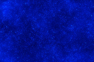 Blue galalxy space. Starry night sky. Glowing stars in the night.