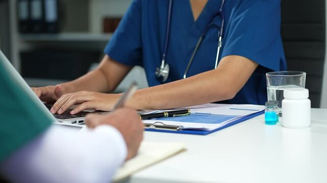 Medical team working on digital tablet healthcare doctor technology tablet using computer analyzed the results of medical reports at the hospital.