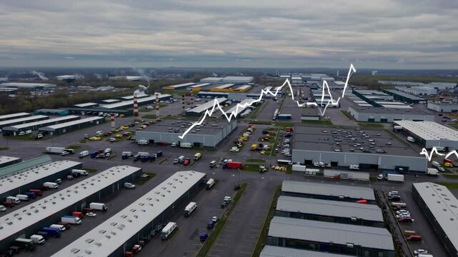 Overview of an industrial area with rising economic indicators during a cloudy day in the heart of the logistics sector