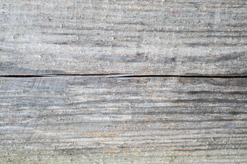 Wooden background. The picture shows a background made of an old cracked wooden board, which looks very expressive and authentic.