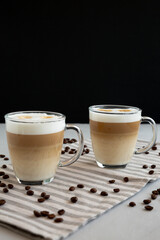 Homemade Latte Macchiato in Glasses, side view.