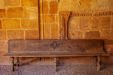 Ancient Spanish Soria stone cloister with rustic walls, historic arches, and medieval architecture. Heritage site imagery for travel, history and cultural projects. High-quality photography showcas